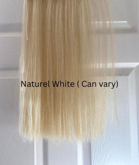 shade of a naturel white custom made clip in mane extension for horses, fake horses forelock hair extensions, helps with fly protection and enhancers missing forelocks