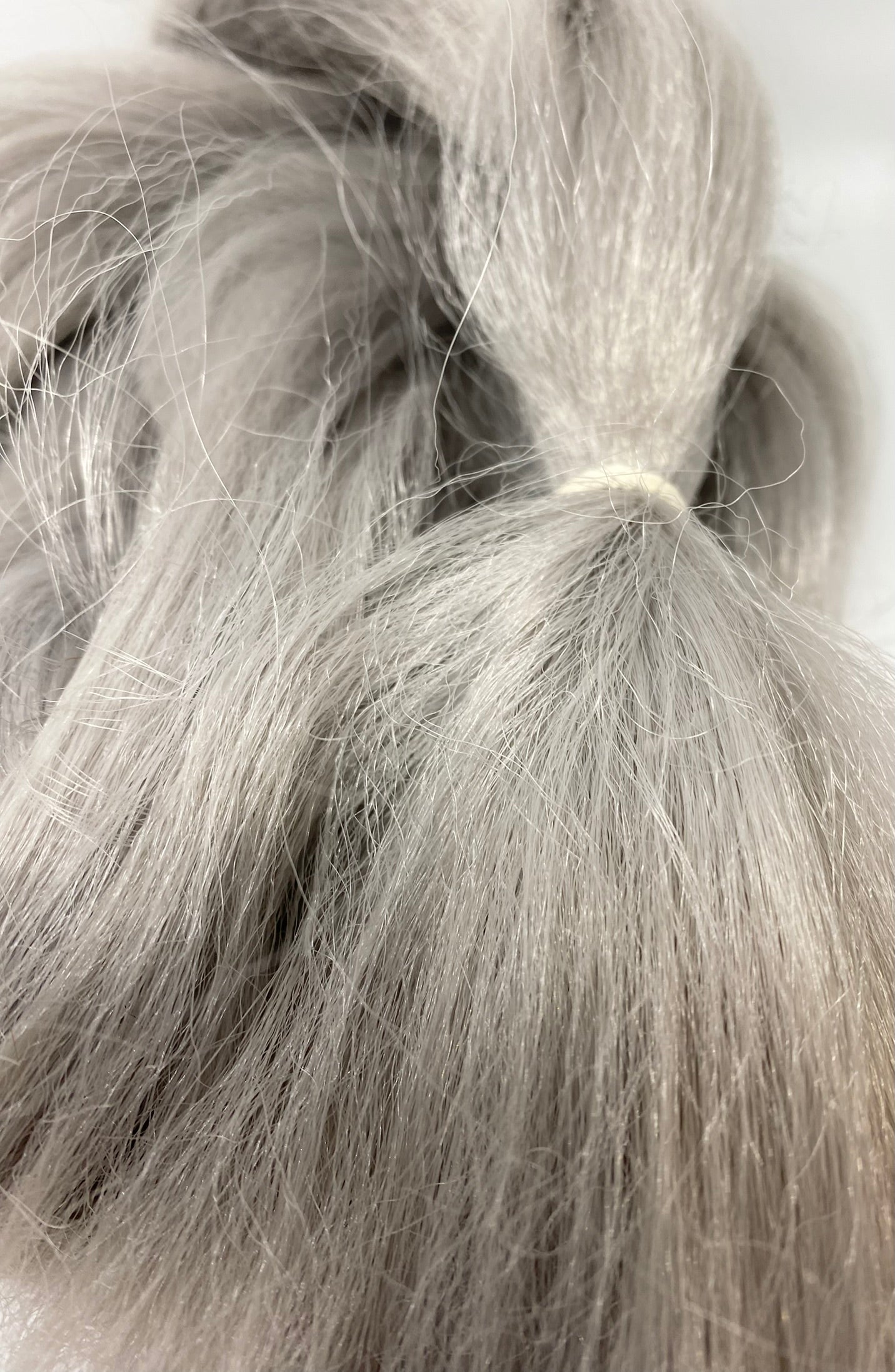 silver grey custom made clip in fake mane extension. DIY fix your horses mane with a clip in